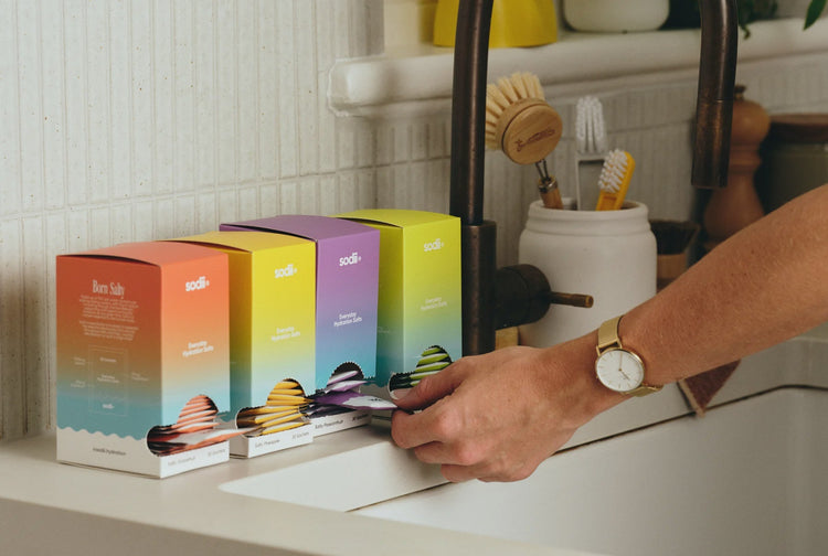 Sodii hydration sachet packs displayed with minimalist packaging, designed for clean electrolyte replenishment with sodium, potassium, and magnesium.